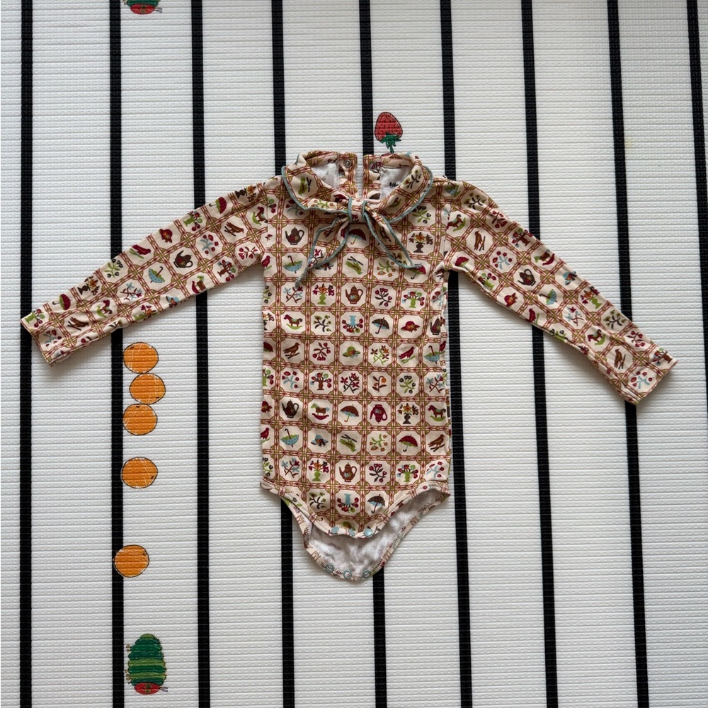 Misha And Puff Patterned Long-Sleeve Onesie